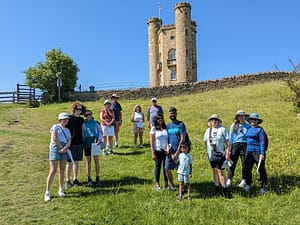 guests walking to Broadway Tower on a Go Cotswolds walking tour